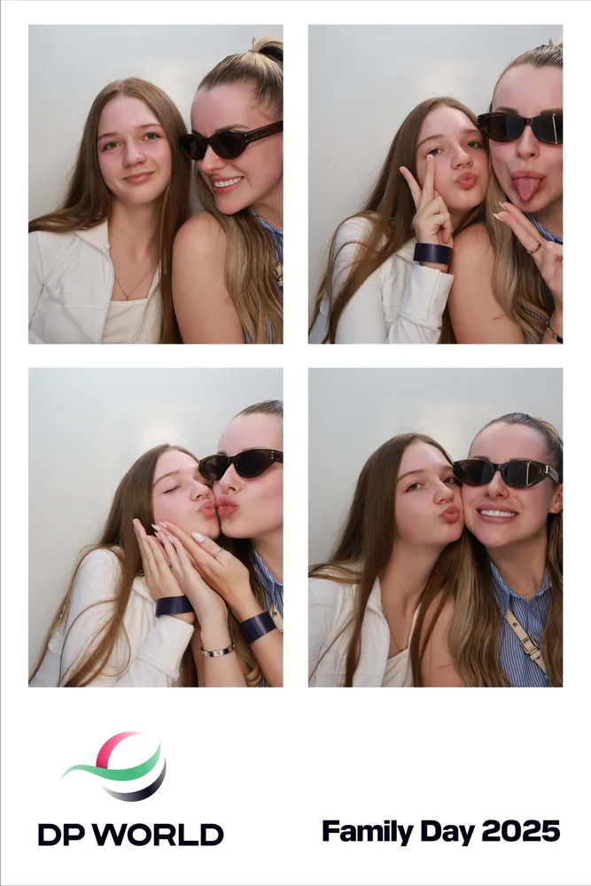 Four guest poses in a DP World Family Day 2025 photo print.